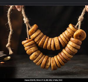 Soft golden Afghan Anjeer dried figs strung on rustic hemp rope