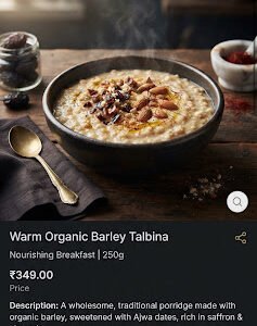 Warm bowl of organic barley Talbina porridge garnished with chopped Ajwa dates, ground almonds, and wild saffron.